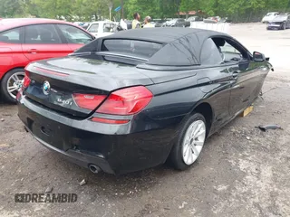 2014 BMW 6 Series 640i z VIN WBALW7C5XED595934, wystawiony jako IAAI lot #42092380 z przebiegiem Nie podano mil oraz . Historia ofert i sprzedaży dostępna na DreamBid. Obrazek 4.