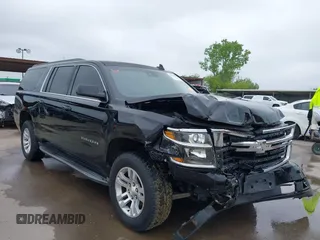 2015 Chevrolet Suburban LT z VIN 1GNSKJKCXFR527023, wystawiony jako IAAI lot #42128656 z przebiegiem 74 854 mil mil oraz . Historia ofert i sprzedaży dostępna na DreamBid. Obrazek 1.