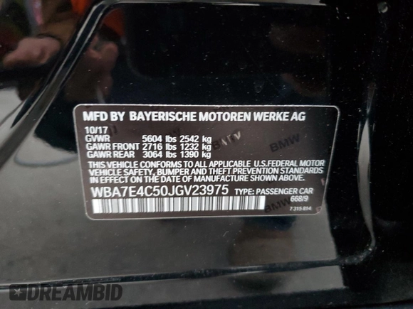 2018 BMW 7 Series 740i xDrive with VIN WBA7E4C50JGV23975, listed as a Copart auction lot 82354264 with 63,657 mi miles and Salvage Title. Bid and sale history available at carsss.com. Image 12.