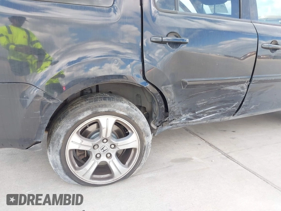 2013 Honda Pilot EX-L with VIN 5FNYF3H51DB019778, listed as a IAAI auction lot 40711477 with 165,505 mi miles and . Bid and sale history available at DreamBid. Image 6.