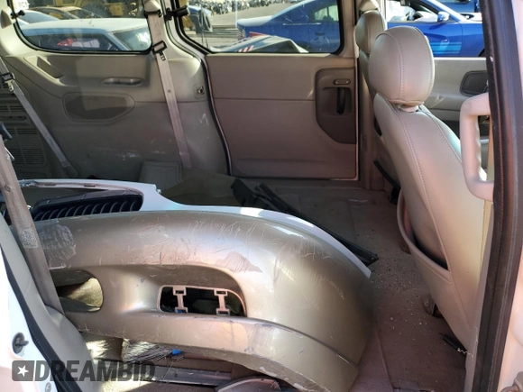 2000 Mercury Villager z VIN 4M2XV14T7YDJ25246, wystawiony jako Copart lot #74589154 z przebiegiem Nie podano mil oraz Tytuł czysty. Historia ofert i sprzedaży dostępna na DreamBid. Obrazek 11.
