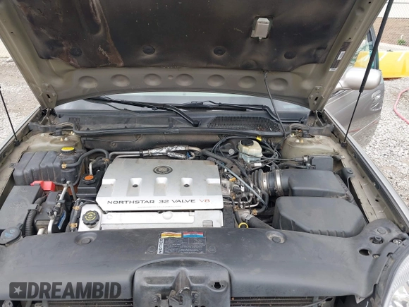 2000 Cadillac DeVille z VIN 1G6KD54Y5YU317015, wystawiony jako IAAI lot #42441249 z przebiegiem 82 901 mil mil oraz . Historia ofert i sprzedaży dostępna na DreamBid. Obrazek 10.