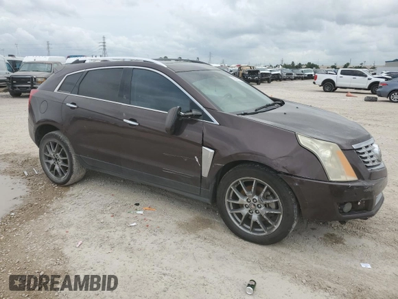 2015 Cadillac SRX Performance Collection with VIN 3GYFNCE38FS571733, listed as a Copart auction lot 54946215 with 147,343 mi miles and Salvage title. Bid and sale history available at DreamBid. Image 4.