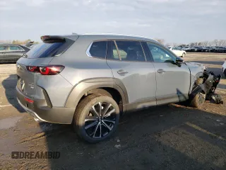 2023 Mazda CX-50 Premium Plus z VIN 7MMVABEYXPN100858, wystawiony jako Copart lot #41536563 z przebiegiem 206 mil mil oraz . Historia ofert i sprzedaży dostępna na DreamBid. Obrazek 3.