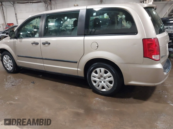 2015 Dodge Grand Caravan SE with VIN 2C4RDGBG2FR592899, listed as a IAAI auction lot 41309499 with 110,428 mi miles and . Bid and sale history available at DreamBid. Image 3.