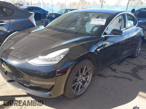2020 Tesla Model 3 Standard Range Plus with VIN 5YJ3E1EA8LF661982, listed as a IAAI auction lot 41700109 with 30,271 mi miles and . Bid and sale history available at DreamBid. Image 20.