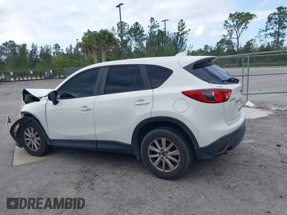 2015 Mazda CX-5 Touring with VIN JM3KE2CY8F0545967, listed as a IAAI auction lot 41909920 with 101,781 mi miles. Bid and sale history available at carsss.com. Image 14.