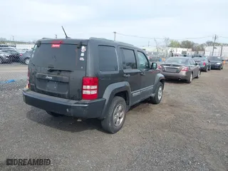 2011 Jeep Liberty Sport with VIN 1J4PN2GK2BW581496, listed as a IAAI auction lot 42080245 with 171,626 mi miles. Bid and sale history available at carsss.com. Image 4.