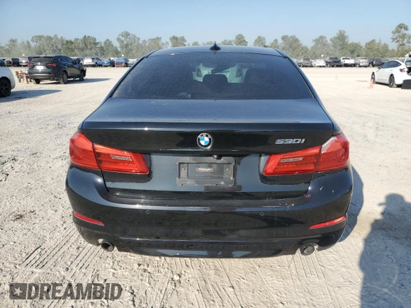 2018 BMW 5 Series 530i with VIN WBAJA5C54JG899845, listed as a Copart auction lot 76386124 with 57,379 mi miles and Salvage Title. Bid and sale history available at DreamBid. Image 6.