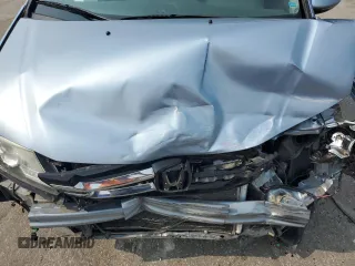 2014 Honda Odyssey Touring with VIN 5FNRL5H95EB080449, listed as a Copart auction lot 58489715 with 154,604 mi miles and Salvage title. Bid and sale history available at DreamBid. Image 12.