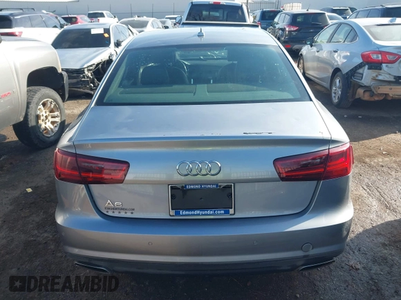2018 Audi A6 Premium with VIN WAUC8AFC1JN011331, listed as a IAAI auction lot 41070804 with 77,514 mi miles. Bid and sale history available at carsss.com. Image 16.