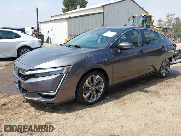 2018 Honda Clarity with VIN JHMZC5F12JC013732, listed as a IAAI auction lot 42157758 with 162,470 mi miles. Bid and sale history available at carsss.com. Image 2.