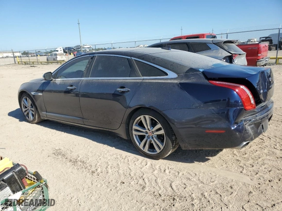 2015 Jaguar XJ with VIN SAJWA2GZ7F8V83170, listed as a Copart auction lot 72815634 with 126,886 mi miles and Salvage Title. Bid and sale history available at carsss.com. Image 2.