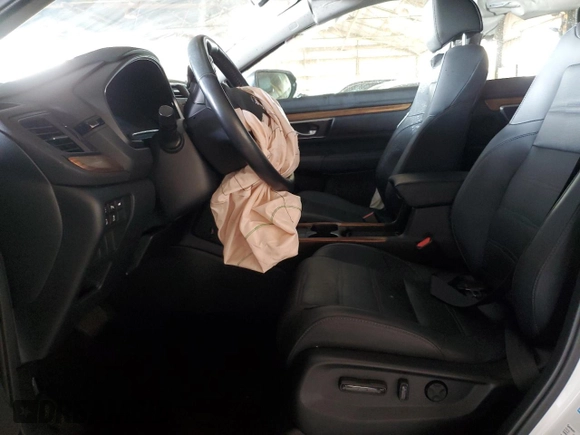 2022 Honda CR-V Touring z VIN 5J6RT6H90NL053771, wystawiony jako Copart lot #51276025 z przebiegiem Nie podano mil oraz Szkoda całkowita • Salvage title. Historia ofert i sprzedaży dostępna na DreamBid. Obrazek 7.