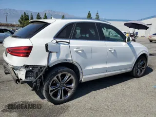 2015 Audi Q3 Premium Plus with VIN WA1BFCFS0FR001987, listed as a Copart auction lot 72962684 with 104,432 mi miles and Salvage title. Bid and sale history available at DreamBid. Image 3.