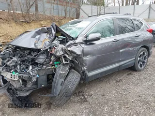 2018 Honda CR-V Touring with VIN 7FARW2H98JE040757, listed as a IAAI auction lot 42044927 with 1 mi miles. Bid and sale history available at carsss.com. Image 2.