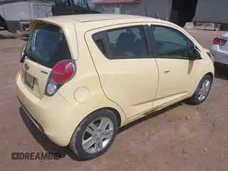 2013 Chevrolet Spark LT with VIN KL8CD6S99DC579079, listed as a IAAI auction lot 42090297 with 101,985 mi miles. Bid and sale history available at carsss.com. Image 4.