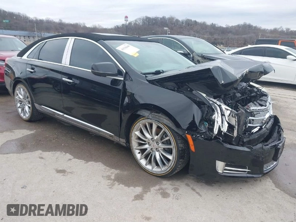 2013 Cadillac XTS Platinum z VIN 2G61V5S37D9194227, wystawiony jako IAAI lot #41510449 z przebiegiem 114 243 mil mil oraz . Historia ofert i sprzedaży dostępna na DreamBid. Obrazek 1.