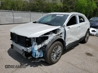 2024 Cadillac XT4 AWD Premium Luxury z VIN 1GYFZDR42RF162925, wystawiony jako Copart lot #57039935 z przebiegiem 3 489 mil mil oraz Czysty tytuł • Clean title. Historia ofert i sprzedaży dostępna na DreamBid. Obrazek 1.