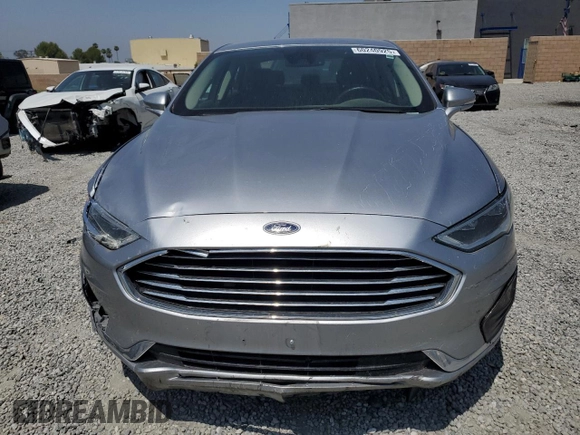2020 Ford Fusion SEL z VIN 3FA6P0CD3LR196210, wystawiony jako Copart lot #60240925 z przebiegiem 81 768 mil mil oraz Szkoda całkowita • Salvage title. Historia ofert i sprzedaży dostępna na DreamBid. Obrazek 5.