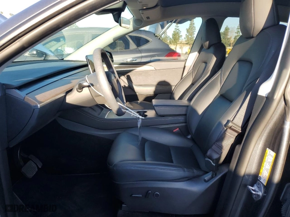 2022 Tesla Model Y Long Range with VIN 7SAYGDEE5NA022384, listed as a Copart auction lot 49283345 with 31,925 mi miles and Salvage Title. Bid and sale history available at carsss.com. Image 7.