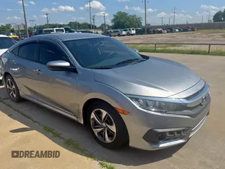 2017 Honda Civic LX z VIN 19XFC2F50HE229233, wystawiony jako Copart lot #61486965 z przebiegiem 99 000 mil mil oraz Szkoda całkowita • Salvage title. Historia ofert i sprzedaży dostępna na DreamBid. Obrazek 1.