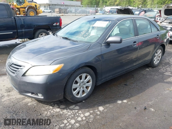 2007 Toyota Camry CE with VIN 4T1BE46K07U127713, listed as a IAAI auction lot 42218369 with 280,048 mi miles and . Bid and sale history available at DreamBid. Image 2.