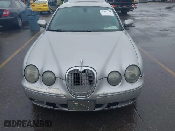 2005 Jaguar S-Type with VIN SAJWA03V451N24124, listed as a IAAI auction lot 42062179 with 286,268 mi miles and . Bid and sale history available at DreamBid. Image 6.