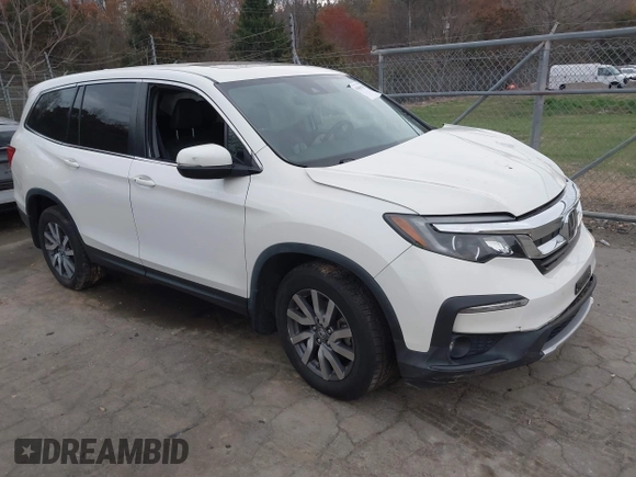 2019 Honda Pilot EX-L with VIN 5FNYF6H59KB075577, listed as a IAAI auction lot 41863841 with 102,242 mi miles and . Bid and sale history available at carsss.com. Image 1.