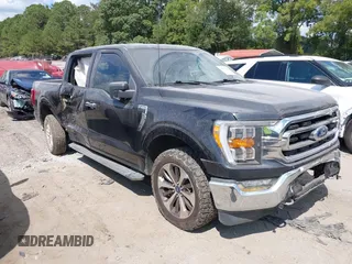 2021 Ford F-150 XL with VIN 1FTFW1E5XMKE21429, listed as a IAAI auction lot 40347406 with 125,000 mi miles. Bid and sale history available at carsss.com. Image 1.