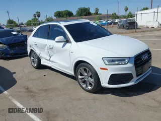 2018 Audi Q3 Premium Plus z VIN WA1JCCFS0JR020083, wystawiony jako IAAI lot #42196825 z przebiegiem 89 511 mil mil oraz . Historia ofert i sprzedaży dostępna na DreamBid. Obrazek 1.