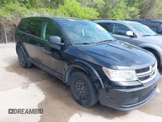 2014 Dodge Journey SE with VIN 3C4PDCABXET235827, listed as a IAAI auction lot 41927966 with 186,179 mi miles and . Bid and sale history available at carsss.com. Image 1.