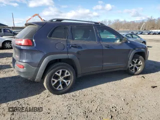 2014 Jeep Cherokee Trailhawk with VIN 1C4PJMBB6EW285745, listed as a Copart auction lot 86968964 with 125,922 mi miles and Salvage Title. Bid and sale history available at carsss.com. Image 3.