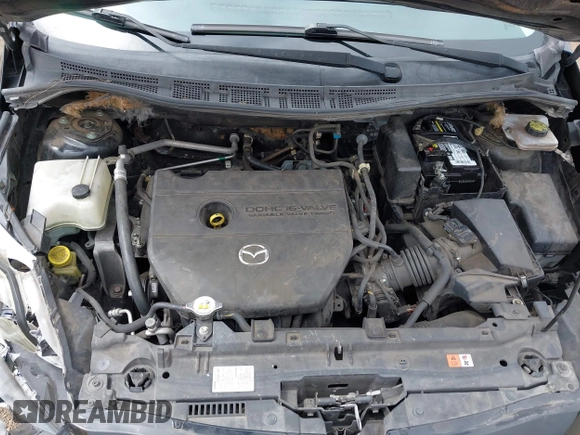 2015 Mazda 5 Sport с VIN JM1CW2BL2F0185045, выставлен на аукционе IAAI как лот 42487509 с пробегом 164 978 миль миль и . История ставок и продаж доступна на DreamBid. Изображение 10.