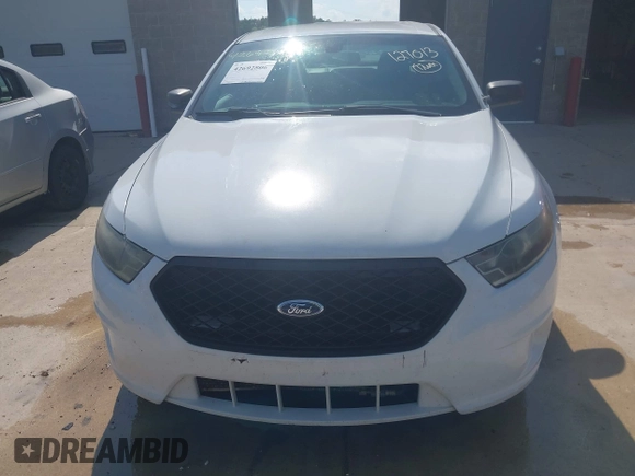 2013 Ford Police Interceptor z VIN 1FAHP2M8XDG127013, wystawiony jako IAAI lot #42692806 z przebiegiem 265 436 mil mil oraz . Historia ofert i sprzedaży dostępna na DreamBid. Obrazek 6.