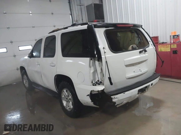 2007 GMC Yukon SLT with VIN 1GKFK130X7R203221, listed as a IAAI auction lot 41583409 with 254,586 mi miles. Bid and sale history available at carsss.com. Image 3.