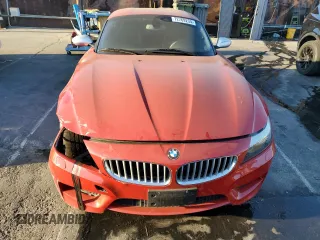 2011 BMW Z4 sDrive35is with VIN WBALM1C54BE393857, listed as a Copart auction lot 72769234 with 88,986 mi miles and Salvage Title. Bid and sale history available at carsss.com. Image 5.