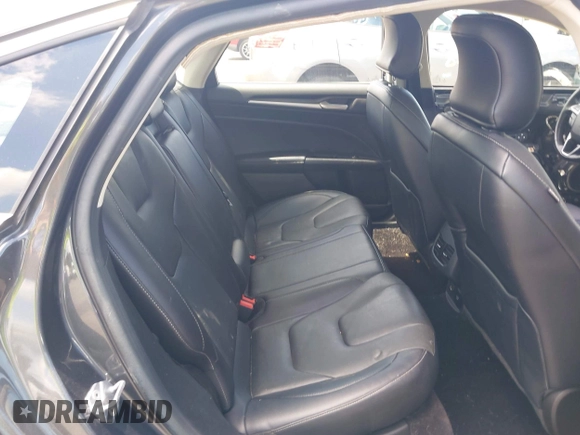 2017 Ford Fusion Titanium z VIN 3FA6P0SUXHR184919, wystawiony jako IAAI lot #42258918 z przebiegiem Nie podano mil oraz . Historia ofert i sprzedaży dostępna na DreamBid. Obrazek 8.