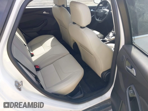 2017 Ford Focus Titanium with VIN 1FADP3N24HL331009, listed as a IAAI auction lot 42029193 with 82,068 mi miles and . Bid and sale history available at carsss.com. Image 8.