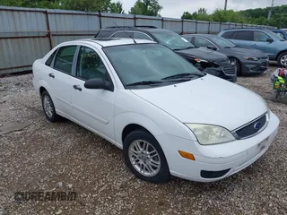 2007 Ford Focus S z VIN 1FAFP34N07W236755, wystawiony jako IAAI lot #42536269 z przebiegiem 116 074 mil mil oraz . Historia ofert i sprzedaży dostępna na DreamBid. Obrazek 1.