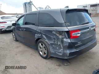 2020 Honda Odyssey EX with VIN 5FNRL6H54LB025555, listed as a IAAI auction lot 42512480 with 95,425 mi miles and . Bid and sale history available at DreamBid. Image 3.