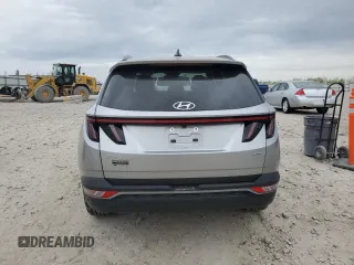 2023 Hyundai Tucson SEL z VIN 5NMJFCAEXPH236650, wystawiony jako Copart lot #56473625 z przebiegiem 45 041 mil mil oraz Szkoda całkowita • Salvage title. Historia ofert i sprzedaży dostępna na DreamBid. Obrazek 6.