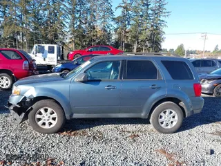 2010 Mazda Tribute Touring with VIN 4F2CY9C73AKM04595, listed as a IAAI auction lot 40797681 with 122,774 mi miles. Bid and sale history available at carsss.com. Image 14.