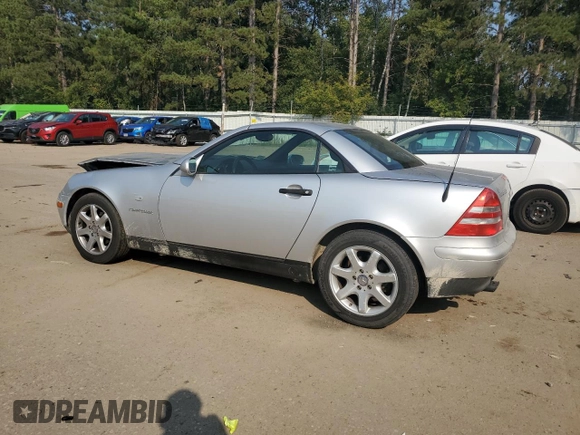 1999 Mercedes-Benz SLK-Class with VIN WDBKK47F9XF127582, listed as a Copart auction lot 71345494 with 187,302 mi miles and Salvage Title. Bid and sale history available at carsss.com. Image 2.
