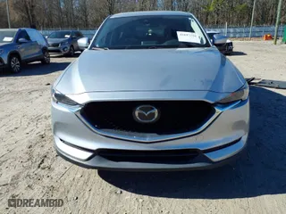 2020 Mazda CX-5 Grand Touring with VIN JM3KFADM7L0731479, listed as a IAAI auction lot 41697226 with 90,517 mi miles. Bid and sale history available at carsss.com. Image 13.
