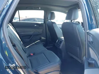 2021 Volkswagen Atlas SE z VIN 1V2KE2CA7MC220524, wystawiony jako IAAI lot #42017287 z przebiegiem 29 380 mil mil oraz . Historia ofert i sprzedaży dostępna na DreamBid. Obrazek 8.