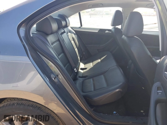 2014 Volkswagen Jetta SE z VIN 3VWD17AJXEM417724, wystawiony jako IAAI lot #42481164 z przebiegiem 98 613 mil mil oraz . Historia ofert i sprzedaży dostępna na DreamBid. Obrazek 8.