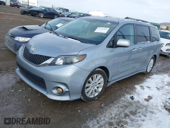 2013 Toyota Sienna SE with VIN 5TDXK3DC0DS354540, listed as a IAAI auction lot 41445501 with 238,814 mi miles and . Bid and sale history available at DreamBid. Image 2.