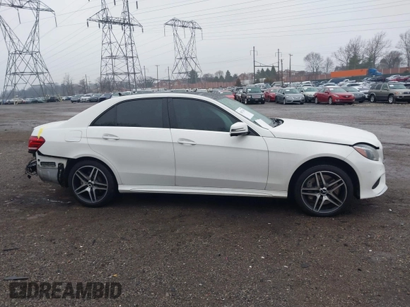 2014 Mercedes-Benz E 550 Sport with VIN WDDHF9BBXEA940995, listed as a IAAI auction lot 41872452 with 50,451 mi miles and . Bid and sale history available at DreamBid. Image 14.
