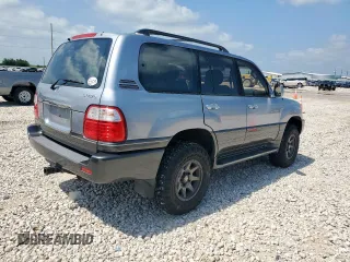 2001 Lexus LX 470 z VIN JTJHT00W313504330, wystawiony jako Copart lot #61126435 z przebiegiem 87 049 mil mil oraz Czysty tytuł • Clean title. Historia ofert i sprzedaży dostępna na DreamBid. Obrazek 3.